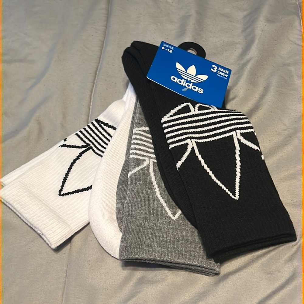New w/tags. Adidas (3) Pair Crew Socks. Shoe sz 6-12